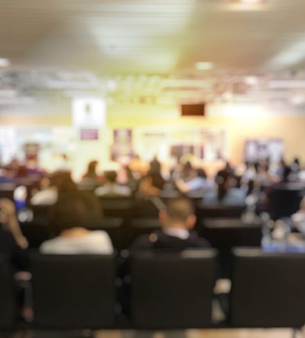 Blurred people in a conference room
